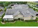 Aerial view of home with landscaped lawn at 1112 Golfview Woods Dr # 1112, Sun City Center, FL 33573