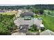 Aerial view of a home featuring a well-manicured neighborhood at 1112 Golfview Woods Dr # 1112, Sun City Center, FL 33573