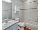 Standard bathroom showcasing a toilet, bathtub, and sink with neutral-colored walls and fixtures at 1112 Golfview Woods Dr # 1112, Sun City Center, FL 33573