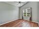 Minimalist bedroom with hardwood floors and a vaulted ceiling at 1112 Golfview Woods Dr # 1112, Sun City Center, FL 33573