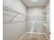 Walk-in closet with wire shelving for optimal storage at 1112 Golfview Woods Dr # 1112, Sun City Center, FL 33573
