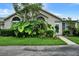 Attractive home surrounded by lush landscaping at 1112 Golfview Woods Dr # 1112, Sun City Center, FL 33573