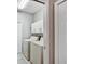 A well-lit laundry room features a washer and dryer, providing convenience and functionality at 1112 Golfview Woods Dr # 1112, Sun City Center, FL 33573
