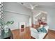 Bright living room with vaulted ceilings, fireplace, hardwood floors, and stylish furniture at 1112 Golfview Woods Dr # 1112, Sun City Center, FL 33573