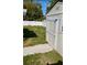Spacious backyard featuring a well-kept shed with green grass and a white fence at 11707 104Th St, Largo, FL 33773