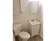 Clean white bathroom featuring a new toilet, vanity and mirror at 11707 104Th St, Largo, FL 33773