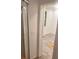 Bathroom entryway view featuring tiled shower and doorway to other rooms at 11707 104Th St, Largo, FL 33773