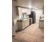 Modern kitchen with sleek countertops, stainless steel appliances, and updated cabinetry at 11707 104Th St, Largo, FL 33773