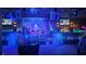 Live music venue with band on stage, stage lighting and person with drink at 1240 Solitude Ln, Sarasota, FL 34242