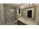 Contemporary bathroom highlighting a glass-enclosed shower, quartz countertop, and premium finishes at 1240 Solitude Ln, Sarasota, FL 34242