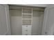 Closet showcases stylish, functional built-in storage solutions, complete with shelves and drawers at 1240 Solitude Ln, Sarasota, FL 34242
