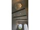 Elegant foyer featuring modern lighting fixtures and high ceilings at 1240 Solitude Ln, Sarasota, FL 34242