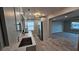 Bright kitchen features modern stainless steel appliances and a new sink with elegant faucet and lots of natural light at 1240 Solitude Ln, Sarasota, FL 34242