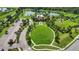 Scenic aerial shot of the community green space, showcasing landscaping and nearby amenities at 13422 Saw Palm Creek Trl, Lakewood Ranch, FL 34211