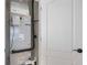 Utility closet featuring a modern Bosch HVAC system and white door at 13422 Saw Palm Creek Trl, Lakewood Ranch, FL 34211