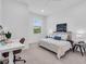 Comfortable bedroom with a desk, a ceiling fan, a double bed and natural light from a window at 15131 Sunny Day Dr, Bradenton, FL 34211