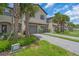 A modern two-story townhouse boasts a private driveway and well-maintained landscaping at 15131 Sunny Day Dr, Bradenton, FL 34211