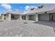 Spacious courtyard with paved flooring, covered seating areas, and outdoor games providing a welcoming outdoor gathering space at 15716 Barefoot Beach Dr, Bradenton, FL 34211