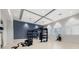 Well-equipped fitness center featuring modern exercise equipment, ample space, and natural light for a complete workout experience at 15716 Barefoot Beach Dr, Bradenton, FL 34211