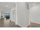 Bright hallway showcases open floor plan leading to a cozy living space with backyard views at 15716 Barefoot Beach Dr, Bradenton, FL 34211