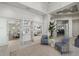 Inviting lobby featuring modern seating, stylish decor, and clear sightlines to the dining area, creating a welcoming atmosphere at 15716 Barefoot Beach Dr, Bradenton, FL 34211