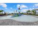 Community splash pad with play structures, a slide, and a bucket drop at 15716 Barefoot Beach Dr, Bradenton, FL 34211