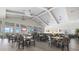 Spacious restaurant with high ceilings, large windows, and ample seating at 15716 Barefoot Beach Dr, Bradenton, FL 34211