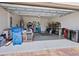 Spacious garage providing ample storage space, bright lighting, and epoxy flooring at 17612 Northwood St, Lakewood Ranch, FL 34202