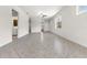 Open living space with tile floors, lots of light and laundry room at 19023 Mangieri St, Venice, FL 34293