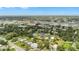 Expansive aerial view of the property showcasing its proximity to local amenities and lush landscaping at 2218 Woodmere Rd, Venice, FL 34293