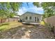 The property features a spacious backyard, enclosed with a wood fence at 2218 Woodmere Rd, Venice, FL 34293