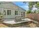 Private backyard patio with picnic table and french doors at 2218 Woodmere Rd, Venice, FL 34293
