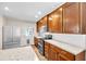 Stylish kitchen features a large island, stainless steel appliances, and generous counter space, perfect for cooking at 2218 Woodmere Rd, Venice, FL 34293
