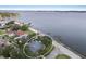 Stunning waterfront home with lush landscaping and ample space for outdoor entertaining with beautiful water views at 2401 Riverview Blvd, Bradenton, FL 34205
