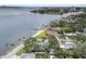 Waterfront property featuring lush landscaping and scenic views, located in a desirable neighborhood with coastal charm and appeal at 2401 Riverview Blvd, Bradenton, FL 34205