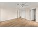 The cozy bedroom offers a ceiling fan, closet, and neutral paint at 2401 Riverview Blvd, Bradenton, FL 34205