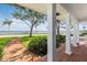 Covered porch showcasing beautiful waterfront views at 2401 Riverview Blvd, Bradenton, FL 34205