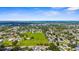 Extensive aerial view of the community, showcasing the green spaces, water views, and surrounding neighborhoods at 2915 29Th W Ave, Bradenton, FL 34205