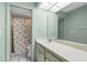 Bathroom featuring a single sink vanity and a tub-shower combo at 2915 29Th W Ave, Bradenton, FL 34205