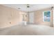 Open living room with neutral walls and access to the dining area and front door at 2915 29Th W Ave, Bradenton, FL 34205