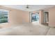 Bright living room featuring carpeted floors, neutral walls and a view of the lanai at 2915 29Th W Ave, Bradenton, FL 34205