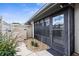 A private patio space features a gate, rock garden and entry to the enclosed lanai at 2915 29Th W Ave, Bradenton, FL 34205