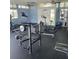 Community gym with treadmills, bike, weights and other workout equipment at 3032 Heron Lake Ct # 7B, Venice, FL 34293