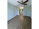 Spacious main bedroom with modern flooring and access to the ensuite bath at 3032 Heron Lake Ct # 7B, Venice, FL 34293