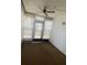 Sun room with carpet and screened windows, creating a comfortable and relaxing space at 3032 Heron Lake Ct # 7B, Venice, FL 34293