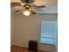 Cozy bedroom with a ceiling fan and wood floors, illuminated by natural light at 3404 56Th Dr E, Bradenton, FL 34203