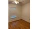 Bright bedroom featuring wood floors and a window with bright natural light at 3404 56Th Dr E, Bradenton, FL 34203