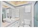 Clean bathroom with a large mirror, white cabinets, and a walk-in shower at 3721 Somerville Dr # 1513, Sarasota, FL 34232