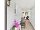 Cozy entryway with seating, neutral tones, and decorative wall accents at 3721 Somerville Dr # 1513, Sarasota, FL 34232