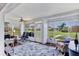 Inviting living room with lots of natural light, comfortable seating, and view of the lawn at 3721 Somerville Dr # 1513, Sarasota, FL 34232